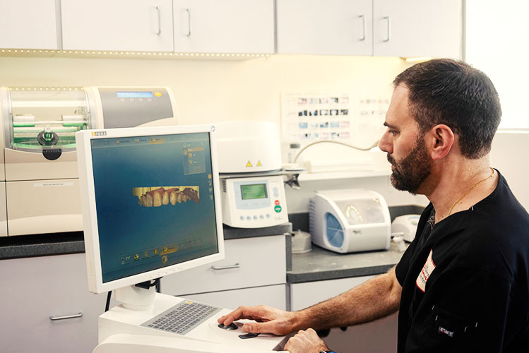 An orthodontist in San Anselmo looking at imaging of teeth